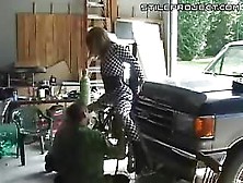 Blonde Chick Tied Up To A Fucking Machine As An Ornament On Front Of Truck