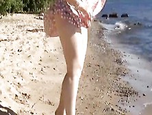 Hot Lady Striptease On The Beach
