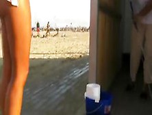 Hot Beach Girl Waits For Her Friend