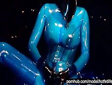 Heavy Pvc Beauty With Huge Melons Into Transparent Blue Pvc Catsuit And