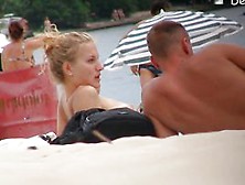 Blonde Model Showing Her Ass On A Nudist Beach