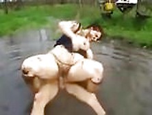 Fuck-Pig Gets Manhandled In The Mud Puddle