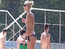 Hot Bikini Babes Tanning At The Pool