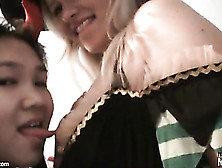 Asian Brunette Is Kissing Nipples Of A Blonde