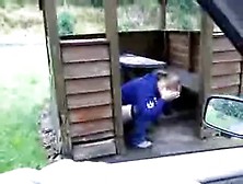 Shitting In A Wooden Outdoor House