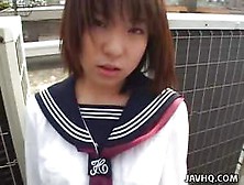 Pretty Asian Girl Rino Sayaka Is Sitting On Hunkers Demonstrating Enjoyable White Panty Up Skirt