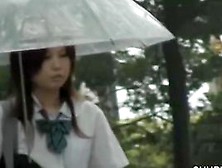 Asian Schoolgirl Gets Street Sharking On A Rainy Day.