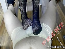 Kinky Chinese Housewife In Fishnets Rubbing Her Mans Dick With Her Feet