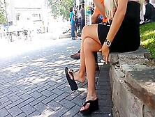 Sexy Blonde Babe Caught Dangling Her Black Shoe In Public