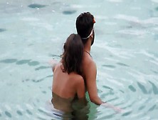 Young Couple Gets Caught Fucking On The Beach - Part 1: Handjob Under Water