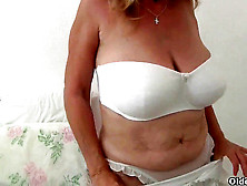 British Granny With Ample Bosoms Gives Her Fanny A Treat