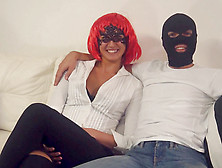 Gal In A Vibrant Red Wig And A Masked Man Do It Up In Style