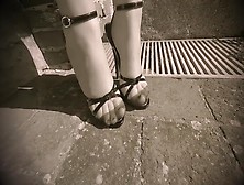 Walking On The Ancient Stone In Domina Sandals And Nylon Stockings