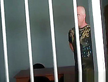 Sexy Dark Haired Bitch Sucks Cock Through Prison Bars