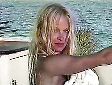 Famous Pamela Anderson Having A Taste Of Her Boyfriend's Penis