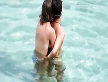 Topless Girlfriend Captured When Giving Handjob In The Water