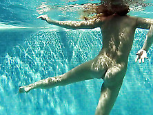 Underwater Solo Teen Swims In The Nude