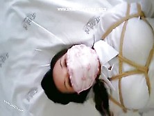 Asian Girl Tightly Bound And Gagged