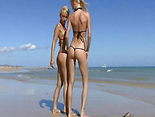 Two Blond Girls Earning Their Vication