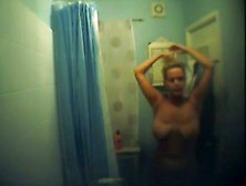 Big Breasted Blonde Captured On A Shower Spy Cam