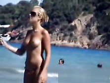 Nude Cutie In The Beach