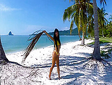 Micro Bikini Tease By Sexy Teen Who Walks On A Beach