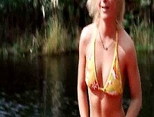 Beautiful Star Whores Out Cleavage & Plunges To Lake