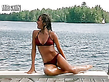 Sexy Woman In Red Two Piece Swims While Waiting For A Boat.