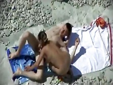 Voyeur Tapes A Couple Having Sex In Various Positions On A Nude Beach