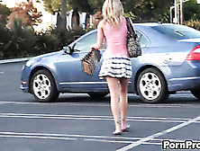 Pretty Miss In A Plaid Skirt And Pink Top Is Filmed While She Casually Shops For Shoes.