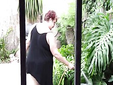 Spying On My Large Bulky Lascivious Aunt Doing The Garden