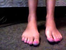 Girl Puts On Black Pantyhose Over Her Toes