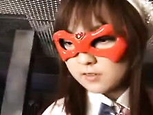 Young Asian Heroine In An Orange Mask Is Taken Down In A Fi