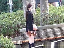 Asian Teen Pulls Up Skirt