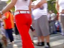 Wonderful Brunette Wearing Red Pants In Public