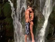 Carmen Electra Kissing Under Waterfall In Baywatch