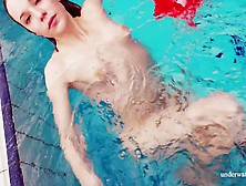 Red Long Dress And Big Tits Floating In The Pool