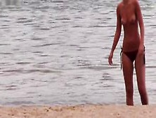 Slim Girl With Sexy Body Filmed With Her Tits Out On The Beach