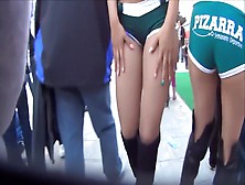 Cute Model In A Miniskirt Mingles With People While Being Filmed