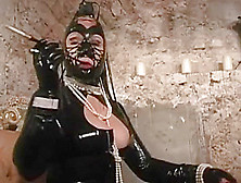 Masked Mistress With Cigarette Holder