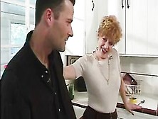 Younger Chap Gets Blown By 70 Year Old Redhead In Kitchen