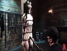 Submissive Brunette Is Put In Chains And Bondage