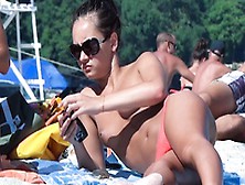 Nude Beach Girl Filmed Enjoying A Sunny Day At The Beach
