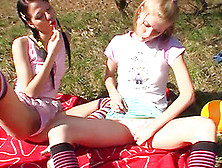 Playful Teens In A Grassy Field Love The Taste Of Pussy