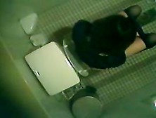 Asian Girls Go Pissing Under A Bathroom Spy Camera