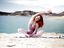 Yoga Stretching On A Lake