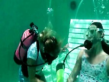 Scuba Woman Tied In Chair Underwater