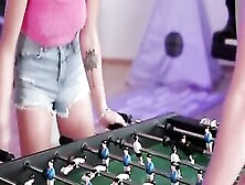 Mia Trejsi And Her Bf Charlie Dean Are Having Fun At Christmastime.  They Play Foosball Together,  With Mia Celebrating Every Poin
