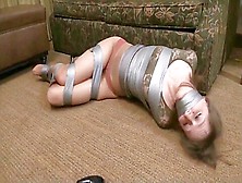Tape Bound And Gagged,  Tries To Escape