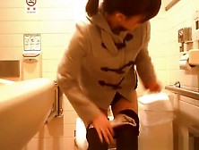 Asian Woman Caught In Public Toilet Peeing